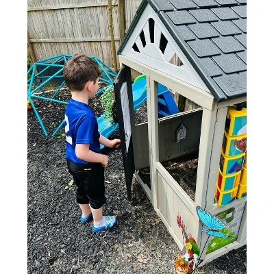 KidKraft Patio Party Wooden Outdoor Playhouse With Spinner Block Puzzle - 14pc - Image 9