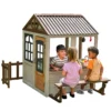 KidKraft Pioneer Cottage Wooden Outdoor Playhouse With Doorbell And 13 Pieces